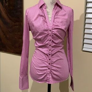 Pink shirt with black dots